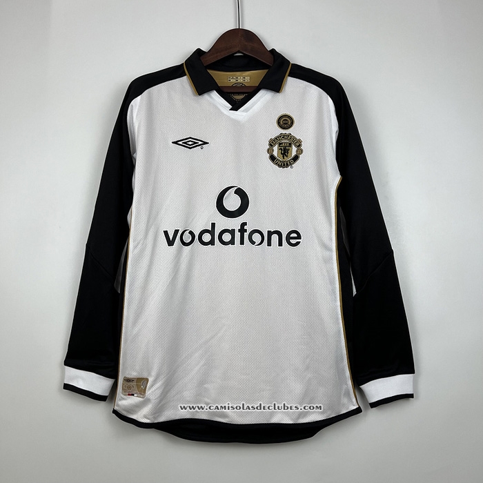 Camisola
 Manchester United Retro 2001-2002 Manga Comprida
 Ponerse En Doble Cara
